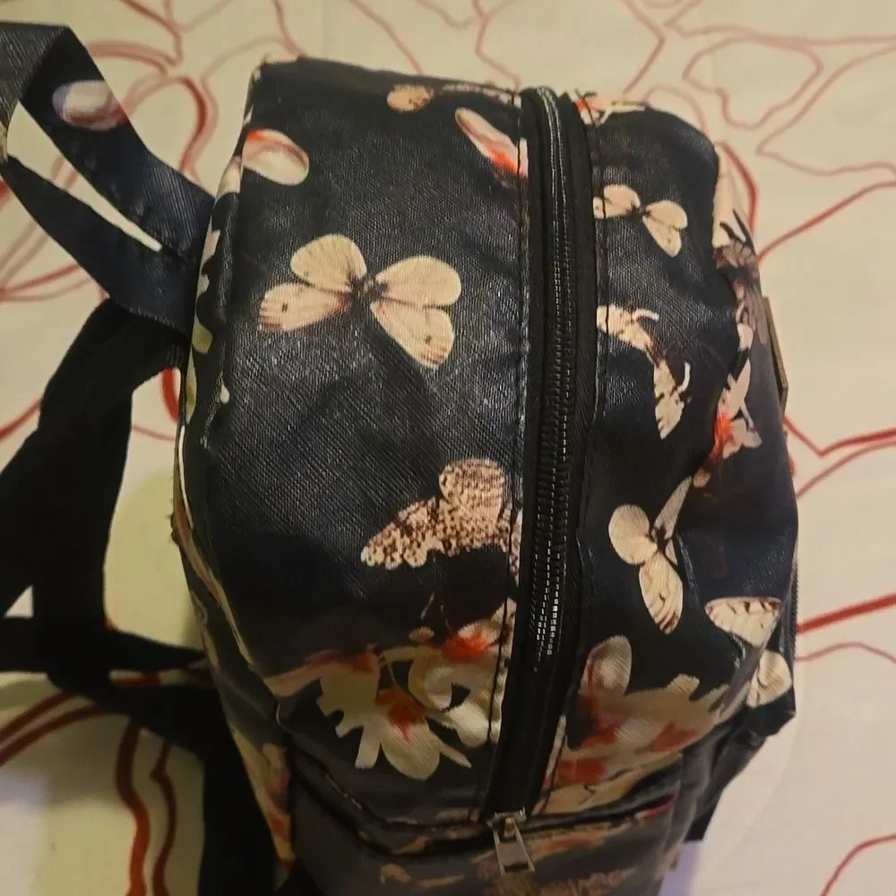 H&L Mini Backpack floral pattern front pocket zippered adjustable casual & chic